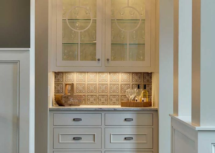 Small bar area with tall cabinets