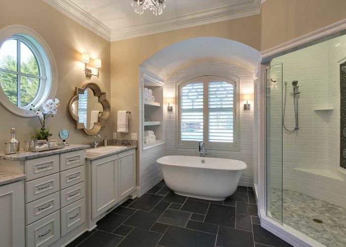 Luxury master bathroom with separate tub and shower