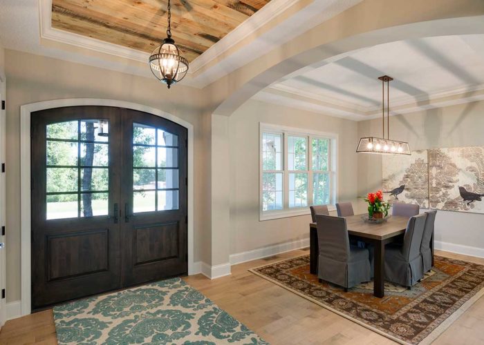 Barn wood ceiling in front entry of home