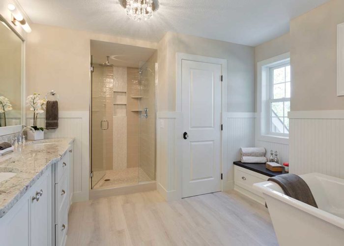 White bathroom with walk in shower