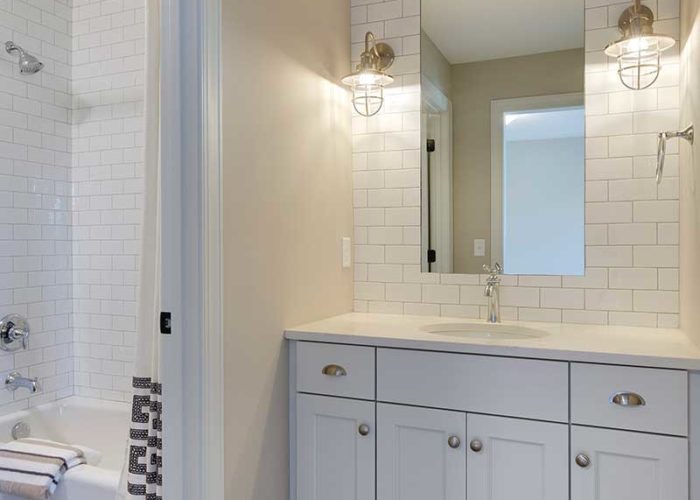 Bathroom vanity with white subway tile backsplash