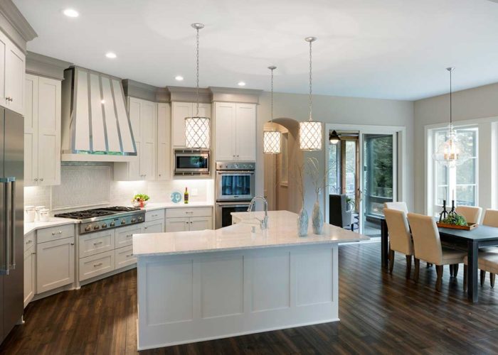 Large white kitchen and dining room