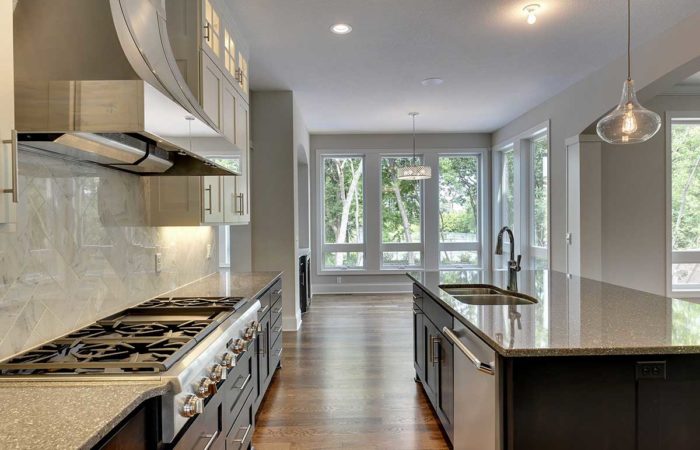 Kitchen space with large island and natural lighting