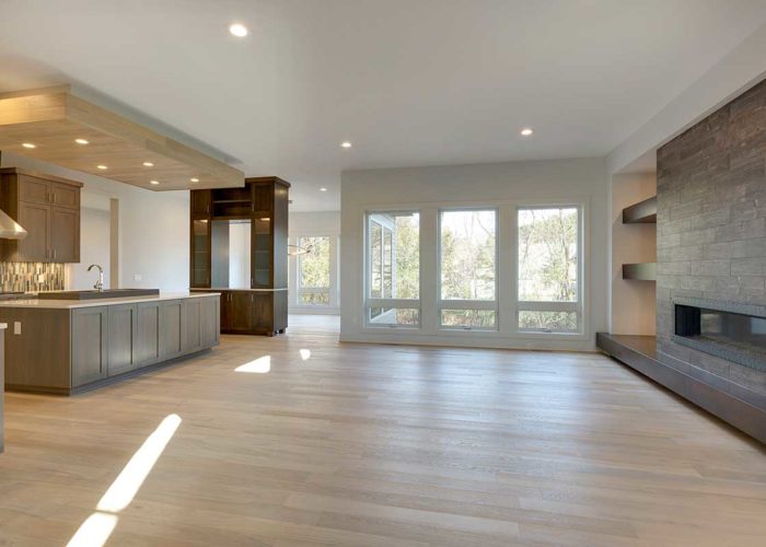 Large unfurnished great room with fire place