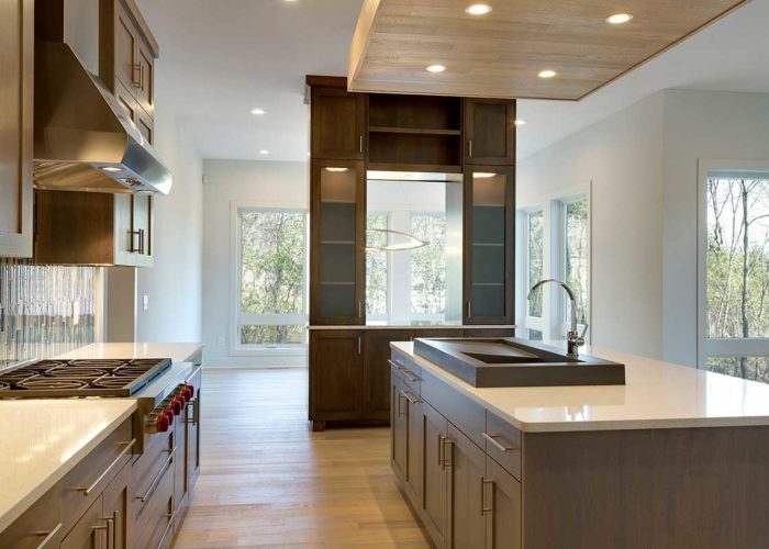 Kitchen space with dark wood cabinets