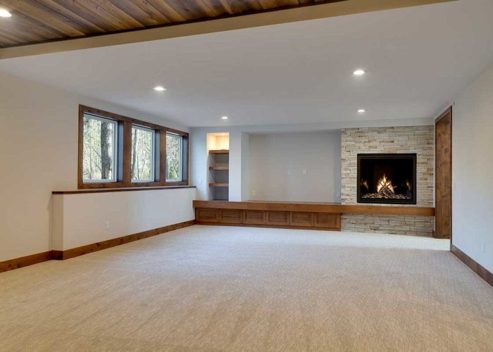 Unfurnished great room with large fire place