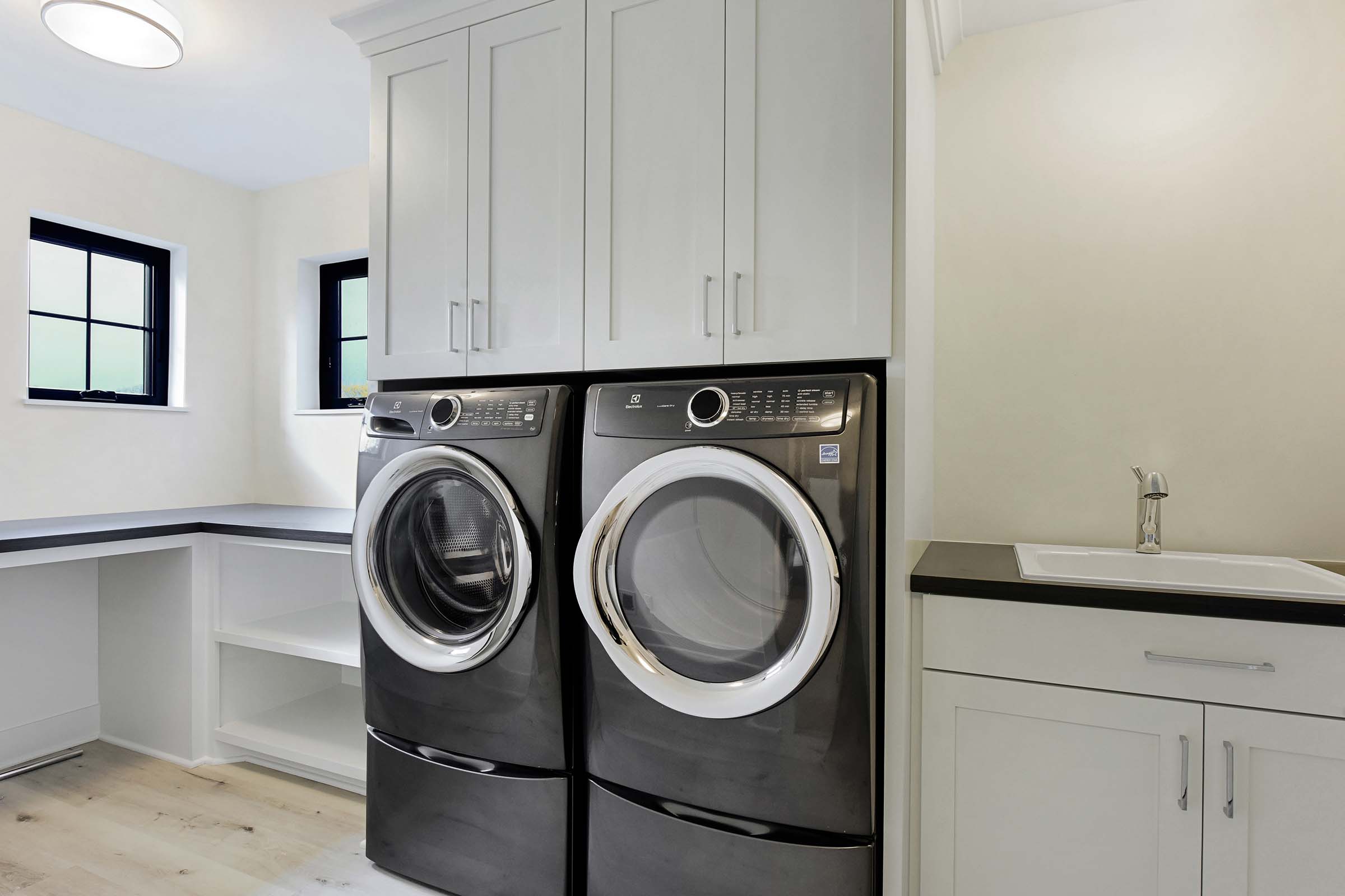 laundry room with custom cabinetry Gonyea homes