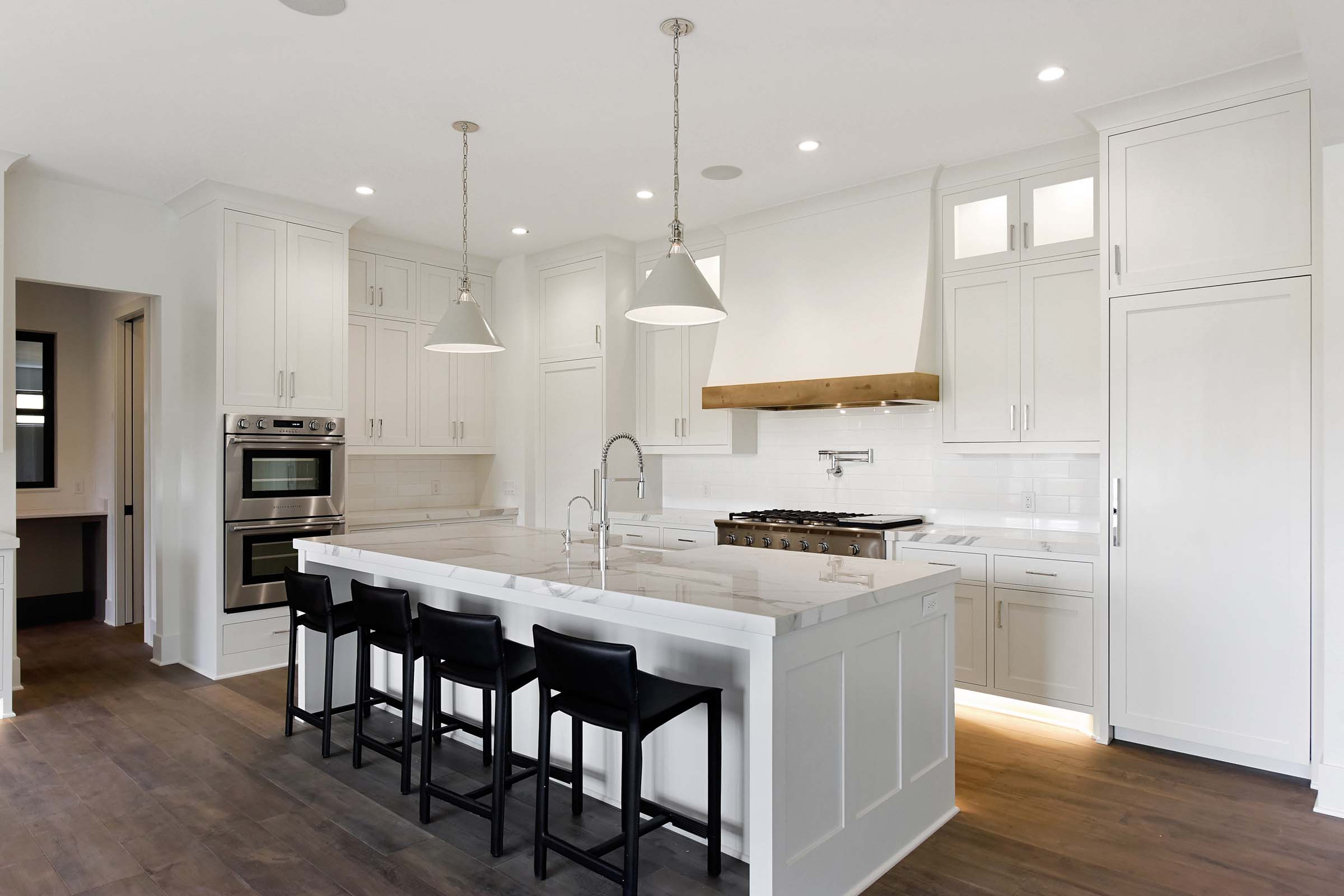 Modern white kitchen and island
