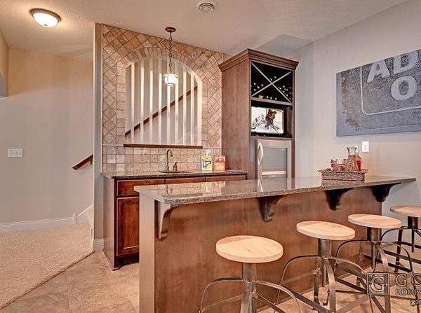 Basement bar area with island stools