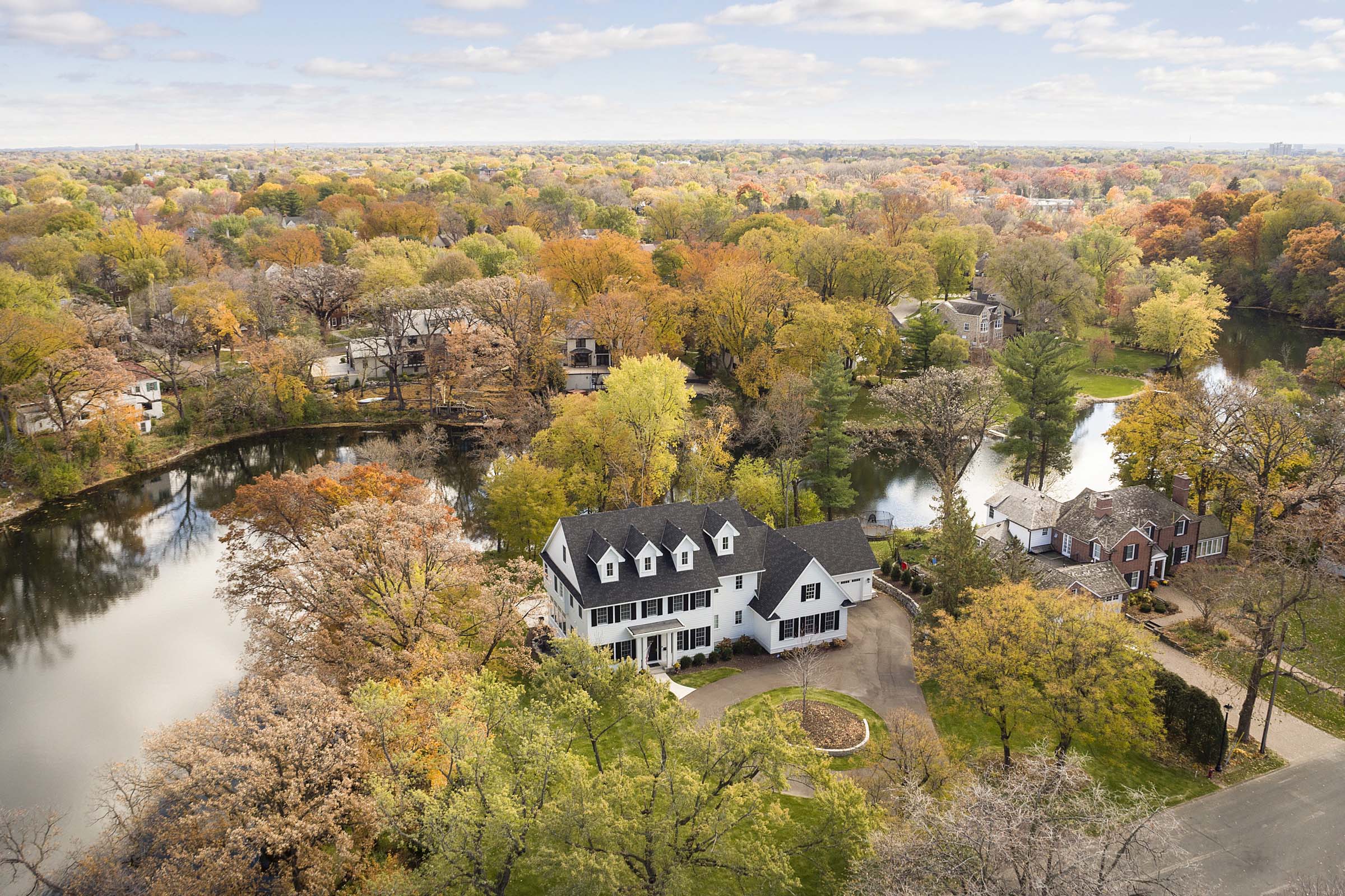 Colonial On The Creek Exterior With Creek behind ariel photo