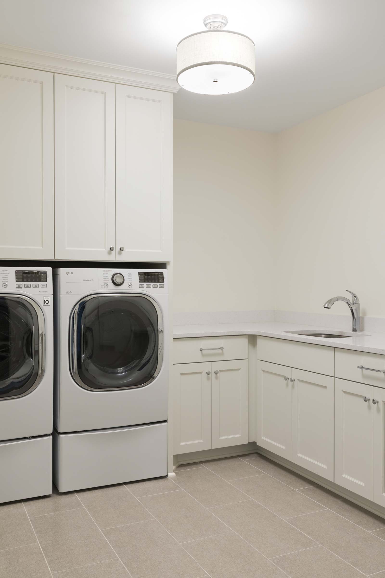 Colonial On The Creek Laundry with custom built-ins