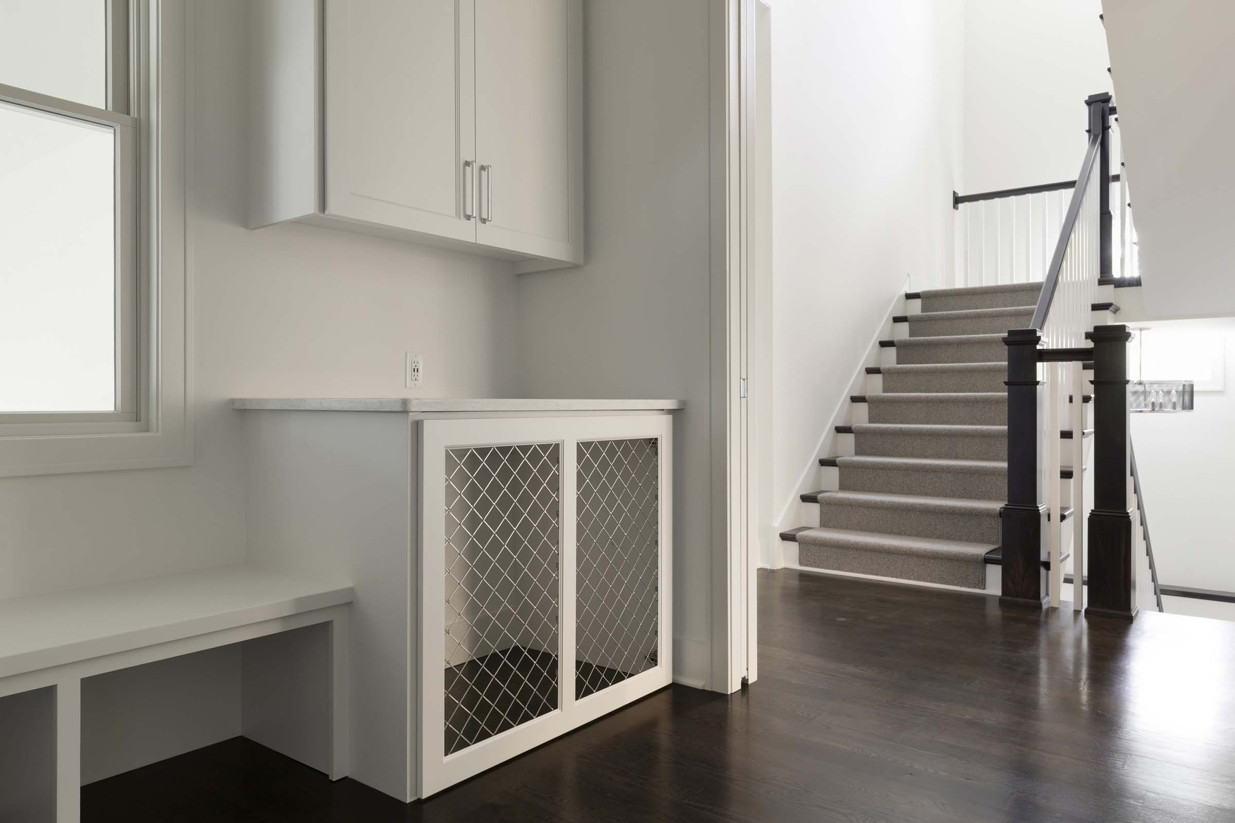 Colonial On The Creek Mudroom Dog Kennel with custom built-in cabinets