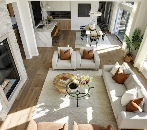 Living Room Dining Room Open Concept Living Space With Large Windows And Fireplace In Minnesota