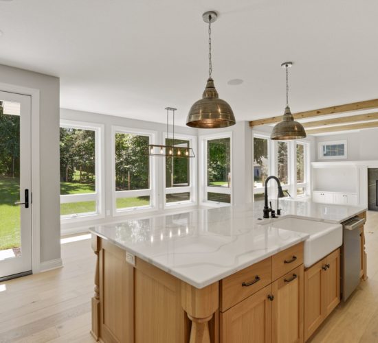 view of kitchen, dining room, and great room