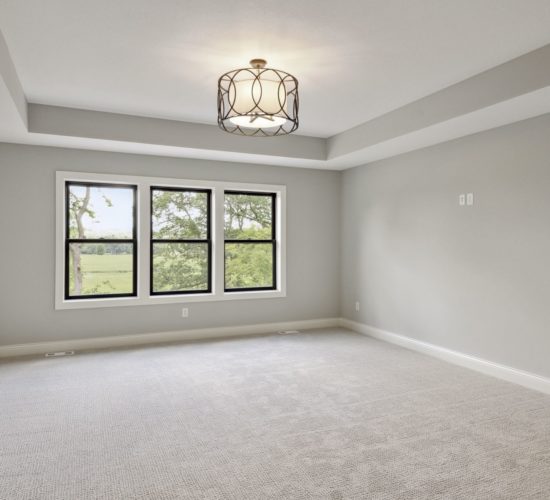 owners bedroom with large window