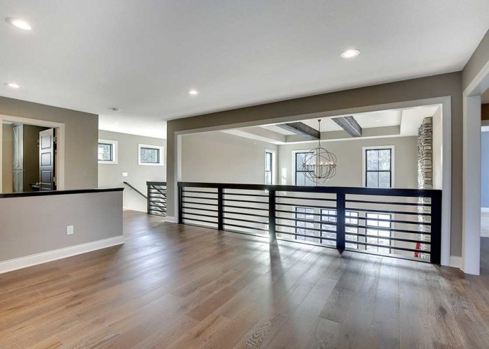 Unique railing in upper level of home